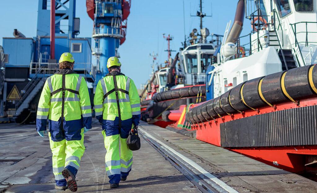 Marine Engineering services in Immingham- showing a photo of workers walking towards the ship